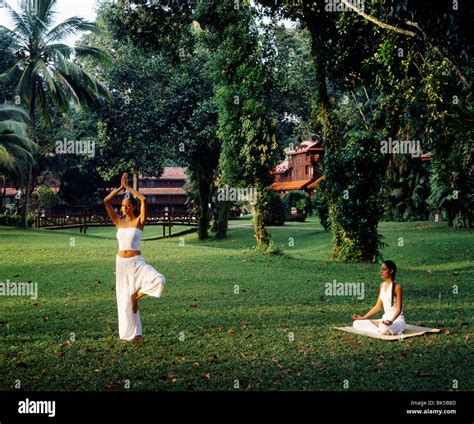 Girls doing yoga at Club Med, Cherating, Malaysia, Southeast Asia, Asia ...