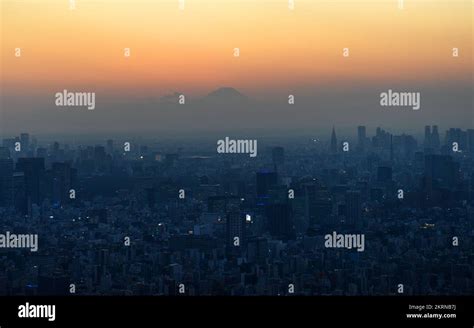 A view of Tokyo with Mount Fuji during sunset. Tokyo, Japan Stock Photo ...