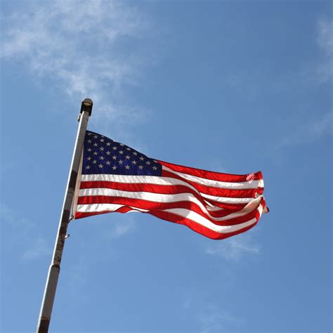 American Flag Atop Flagpole – Photos Public Domain