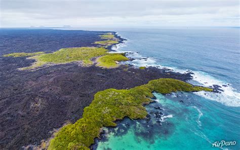 Above the southern coast of Isabela Island