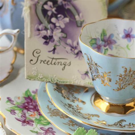 Perfectly pretty gilded blue and violets vintage tea set.. one of my absolute favorites. Have a ...