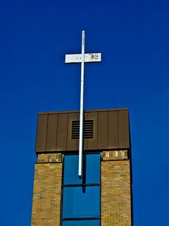 handmade cross on modern church | cross against blue sky on … | Flickr