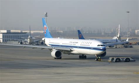 China Southern Airlines issues apology and suspends staff member who called passenger a ‘dog ...