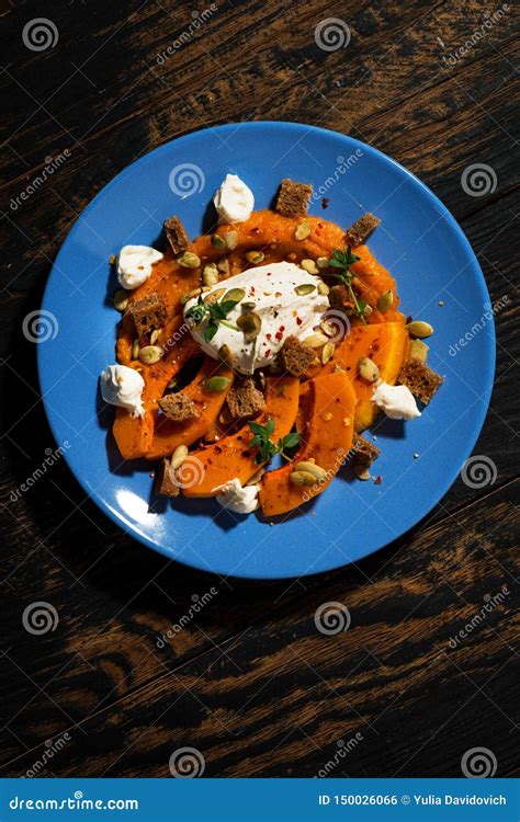 Baked Pumpkin Salad with Cream Cheese and Croutons, Vertical Top View ...