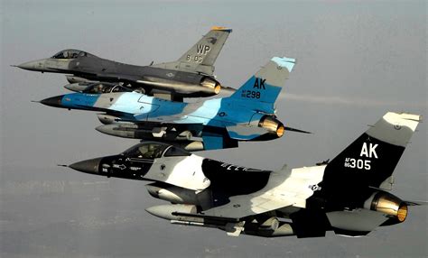 Three U.S. Air Force F-16 Fighting Falcon Block 30 aircraft from the ...