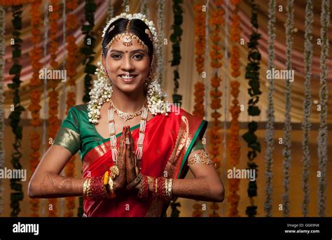 Indian woman greeting Namaste Stock Photo - Alamy