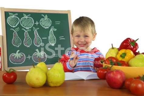 Boy Solves Math Problems Stock Photo | Royalty-Free | FreeImages