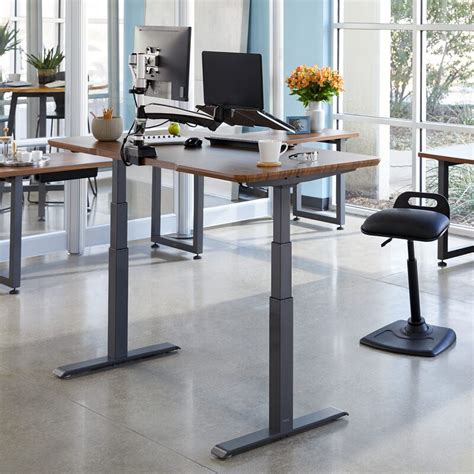 Vari Electric Standing Desk Is a Must-Have for Your Home Office - Newsweek