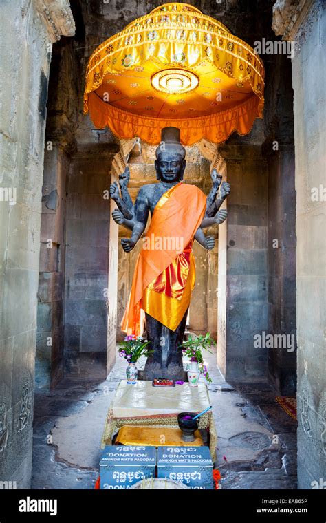 Cambodia, Angkor Wat. Vishnu Statue inside the Entrance to the temple ...