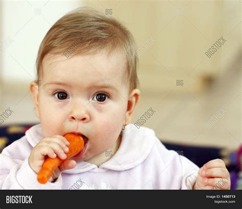 Small Baby Eating Image & Photo (Free Trial) | Bigstock