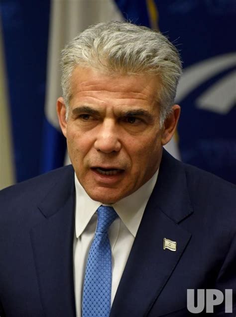 Yair Lapid, Chairman of the Yesh Atid Party, speaks during his party meeting in the Knesset, the ...