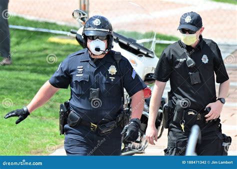 Denver Police Officers Getting Ready To Keep the Peace during the Riots ...