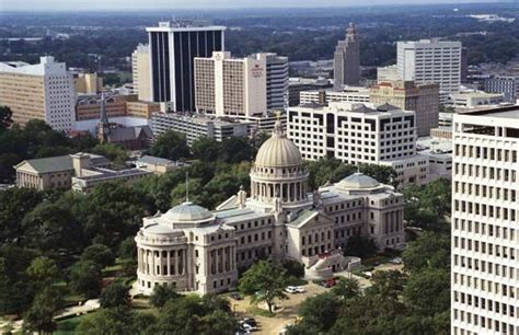 The State Capitol of Jackson, Mississippi, is nestled between high-rise ...