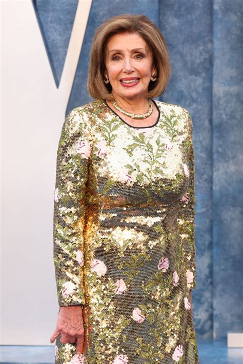 Nancy Pelosi Goes for Gold at Vanity Fair Oscars Party in Floral Dress