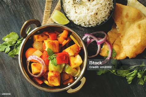 Kadai Paneer Served With Rice And Bhatura Stock Photo - Download Image Now - Basmati Rice, Bell ...