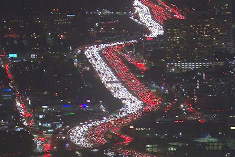 Los Angeles 405 Freeway in traffic gridlock as US families escape for ...