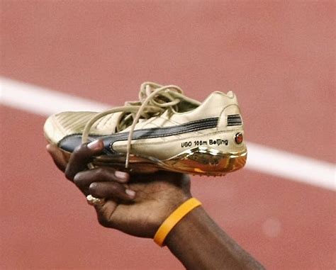 The Running Shoe Guru: Usain Bolt's record breaking spikes - Olympic Gold