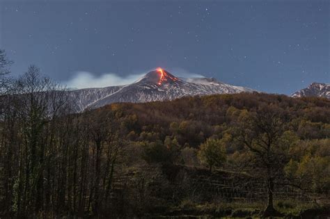 Mount Etna eruption sends lava spewing and huge column of gas into night sky - World News ...