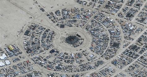 Burning Man turns to mud pit as attendees urged to shelter in place ...