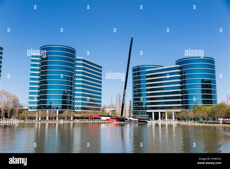 Oracle Corporation headquarters / buildings with a Oracle Team USA yacht racing boat in a pool ...