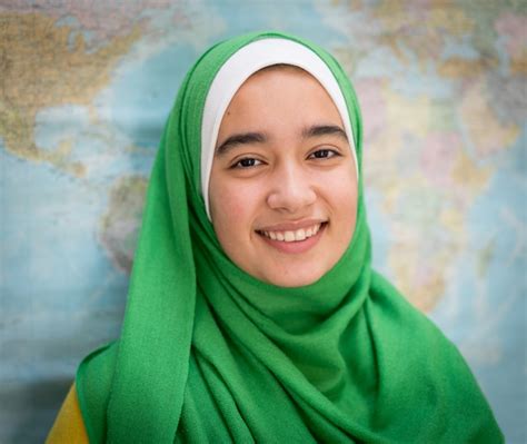 Premium Photo | Muslim girl with world map