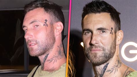 Adam Levine Sets Record Straight on His Face Tattoo | Entertainment Tonight