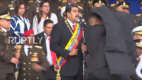 VIDEOS show Maduro’s speech cut midway by explosion, panic ensues — RT ...