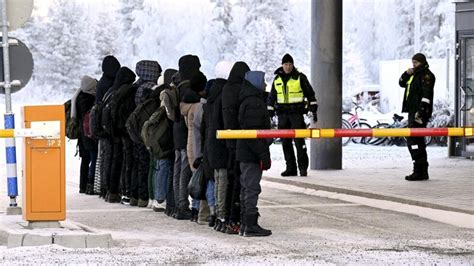 Finland erects barriers at border with Russia to control migrant influx