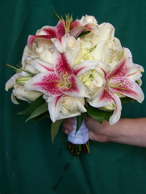 PINK LILY BRIDAL BOUQUET. BRIDAL BOUQUET - ASSOCIATED CUT FLOWER