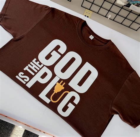 God is the Plug Shirt | Being Perfected Inc.