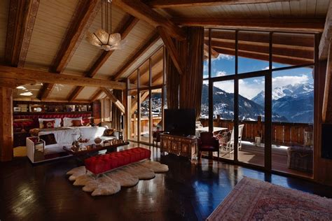 Beautiful interior with stunning view on the Swiss mountains ...