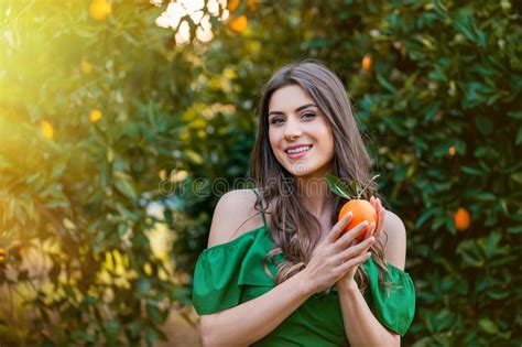 Beautiful Woman in Nature at Sunset Stock Photo - Image of happiness, garden: 120851436