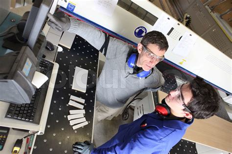 Workmen in a factory | Stock image | Colourbox