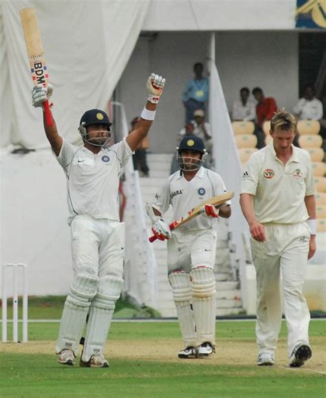 Virat Kohli raises his bat to celebrate his century | ESPNcricinfo.com