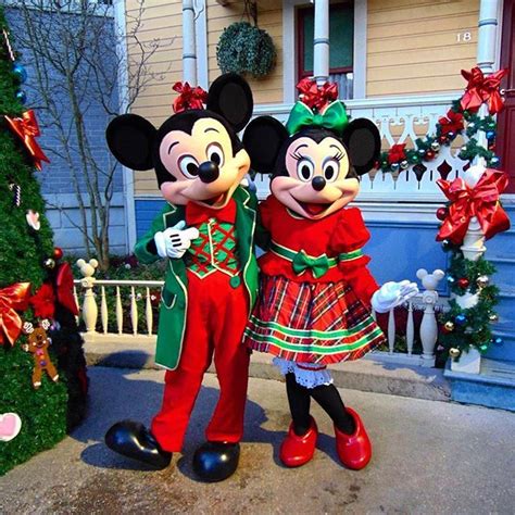 Mickey and Minnie Mouse in their Christmas outfits on Main Street USA in Disneyland Paris DLP