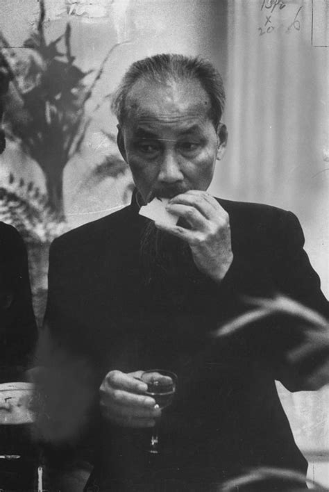 Vietnamese Communist leader Ho Chi Minh eating at a reception during his official visit to ...