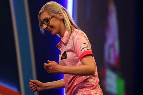 Fallon Sherrock becomes first woman to hit nine-dart finish in PDC event