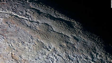 Pluto's snow-capped mountains look like they belong on Earth, but they're entirely different - CNN