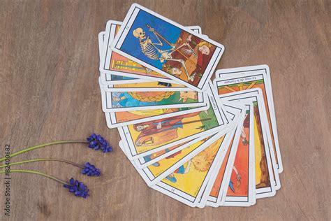 Cards of divination tarot with flowers Stock Photo | Adobe Stock