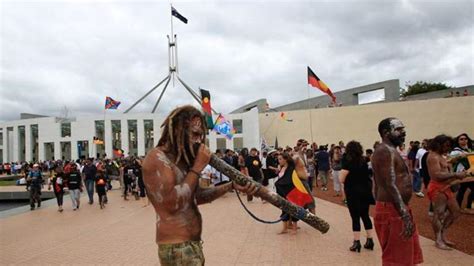 Aboriginal protesters torch Australian flag outside Parliament