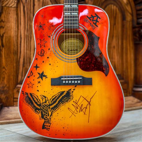 Help me win this kickass guitar from CountryRebel.com signed by Ashley ...