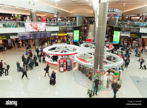 Shops and restaurants in departure lounge of London Gatwick Airport LGW ...