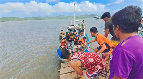 Philippine Coast Guard saves 41 passengers, five crew members from half-submerged boat - The ...