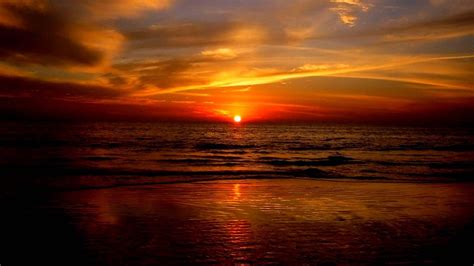 Download Dark Ocean Sunset Beach Wallpaper | Wallpapers.com