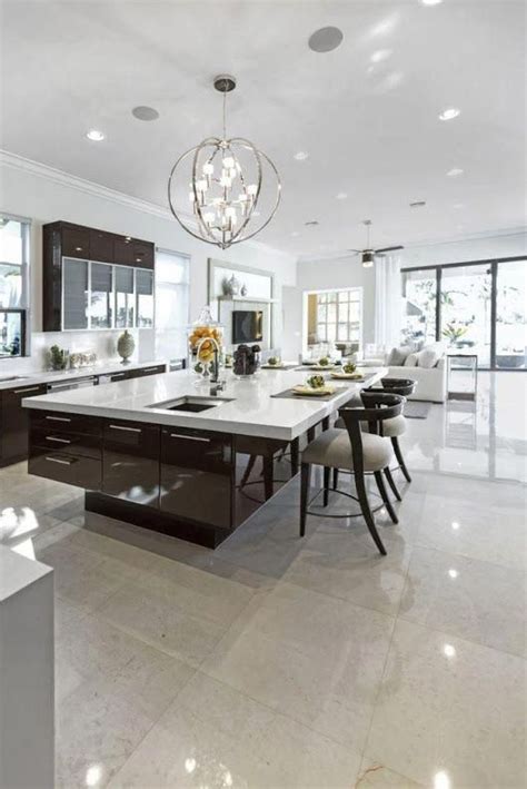 Like the large light fixture above the very large island #ModernHomeDecorKitchen | Luxury ...