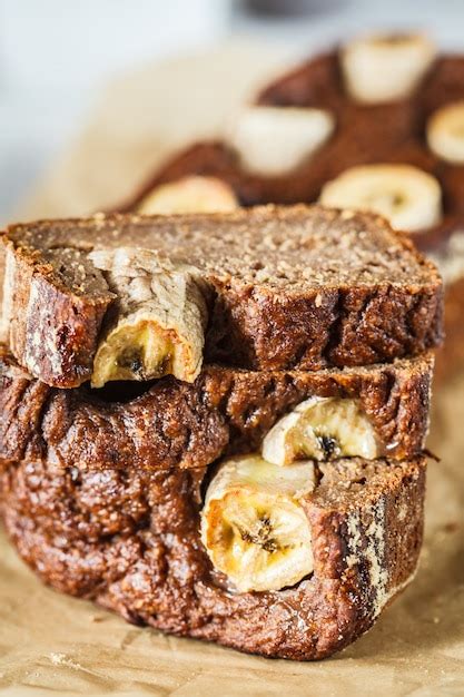 Premium Photo | Homemade sliced banana bread on a white background.