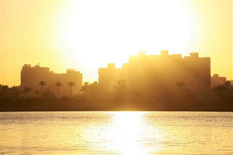 Premium Photo | Sunset cairo from the river nile bridge