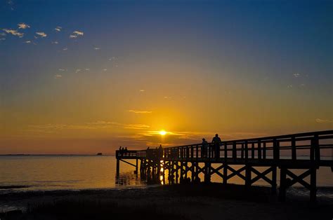 Sunset at Crystal Beach Pier Photograph by Bill Cannon