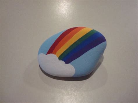 Items similar to Hand painted rainbow rock on Etsy