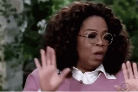 Oprah Winfrey Look Away Hands Up Glasses GIF | GIFDB.com